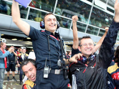 Race engineer Riccardo Adami and the Scuderia Toro Rosso crew celebrating the first pole position of Sebastian Vettel, 2008