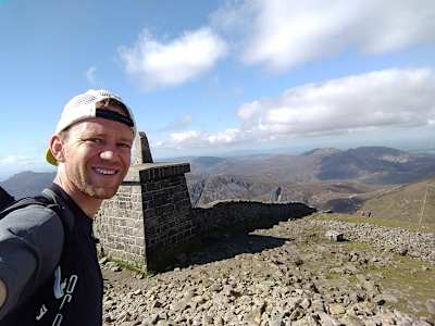 Forrest at the summit of Northern Ireland's highest peak, Slieve Donard