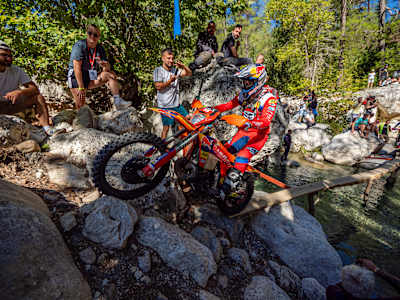 Wade Young rides through a rocky stream during the 2025 FIM Hard Enduro World Championship Sea To Sky at Kemer, Antalya, Turkey, in Red Bull colours