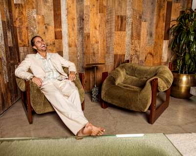 Australian DJ Fisher relaxing with a smile