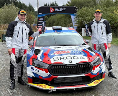 Co-driver Haapala and Suninen celebrate their Qualifying Stage best