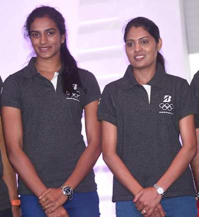Lalita Babar (right) and PV Sindhu being felicitated