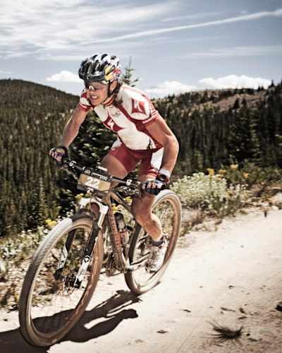 Mountain bike cross country rider Rebecca Rusch on a trail
