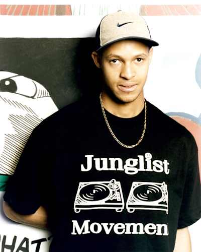 Man wearing Junglist Movement T-shirt