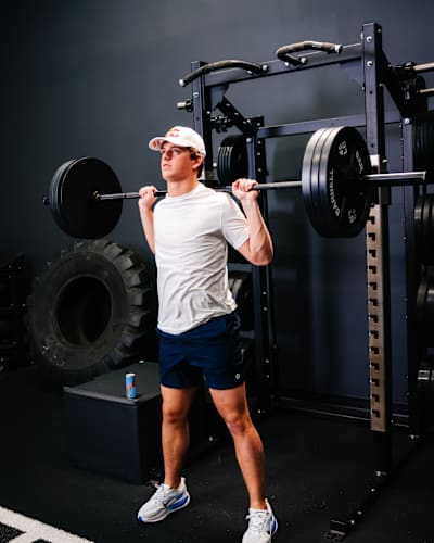 Arch Manning pushing through squat reps for injury prevention
