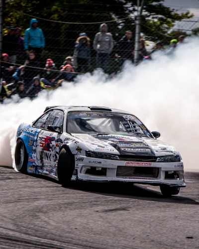 An image of a race car in action at the Drift Masters European Championship.