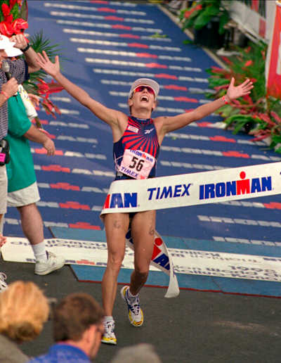 Natascha at the finish line of the 20th anniversary triathlon.