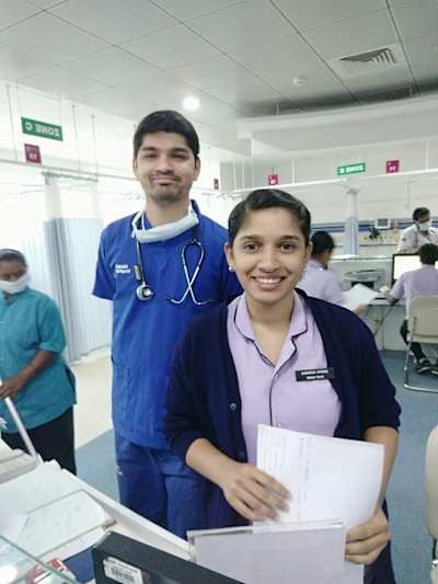 Gokul with a colleague at the hospital Gokul with a colleague at the hospital