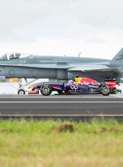 F1 Car Races Against An F A 18 Hornet Video