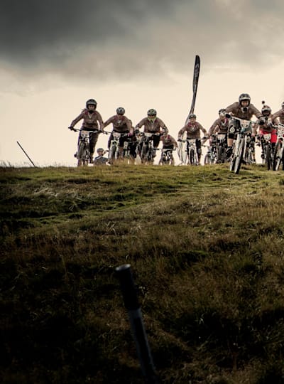Competitors tear down the hill at Red Bull Foxhunt