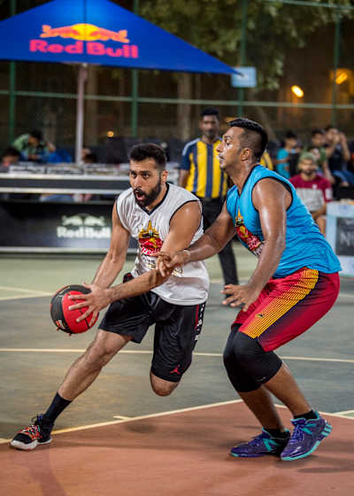 Players compete on a half court basketball game at the Red Bull Reign 2019 India Finals.