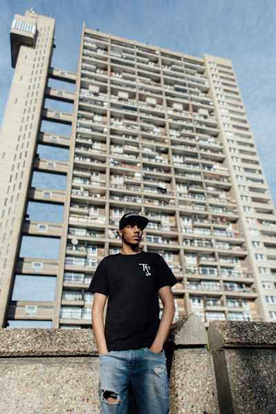 AJ Tracey, shot by Vicky Grout at Trellick Tower, 2017