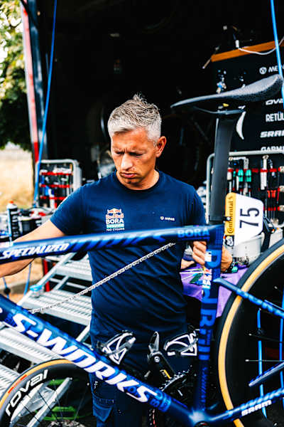 The freshly waxed chains are ready for the next stage.