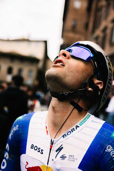 Gianni Vermeersch at the finish of Strade Bianche 2026