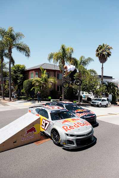 Garett Reynolds jumps the new paint reveal cars