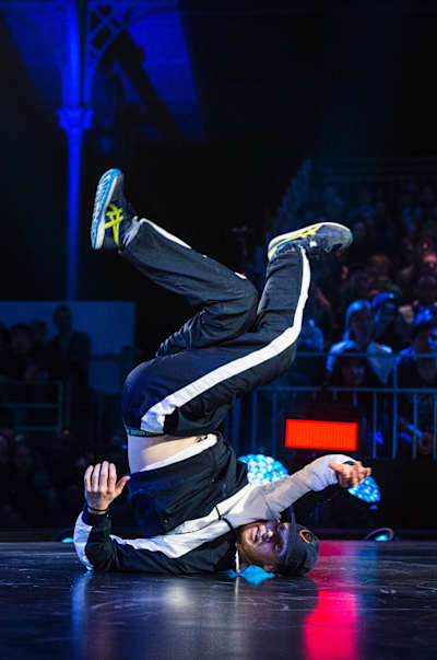 Menno performs a shoulder spin at the Red Bull BC One World Final 2014