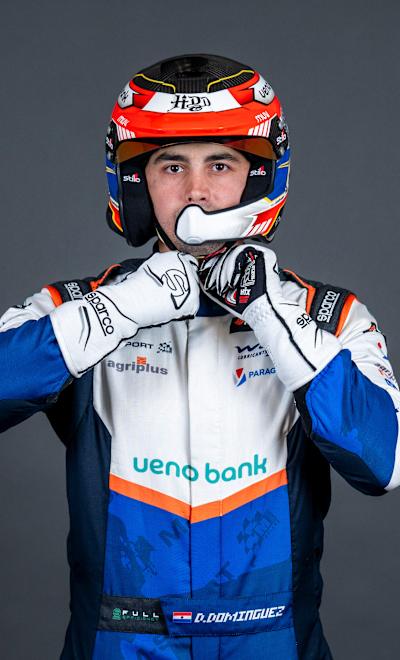 In 2025, Diego Dominguez in Red Bull racing gear poses during the World Rally Championship event in Umea, Sweden