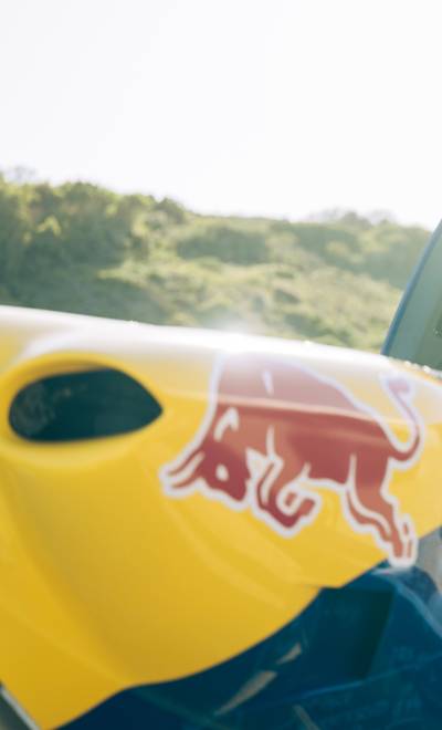 Patrick Davidson readies his Red Bull plane at Red Bull Can Grab, Gqeberha, South Africa, May 2025, embodying high-speed adrenaline and aerial precision at this electrifying event