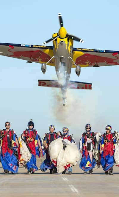 Kirby Chambliss takes flight over the Red Bull Air Force.