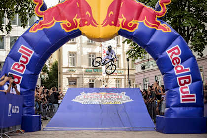 Alex Marin launches over the ramp at Red Bull Stuttgart Cerro Abajo in Stuttgart, Germany, thrilling the crowd during the 2026 urban downhill event