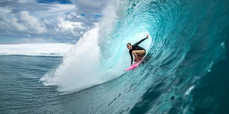 Carissa Moore rides the tube at Teahupo'o in Tahiti