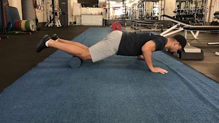 Foam roller push-ups can help take a literal load off.