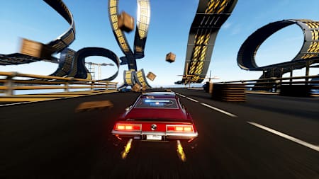 Screenshot aus Wreckreation zeigt ein Auto mit brennendem Auspuff, das auf einen Looping zufährt. Vom Himmel fallen Holzkisten.