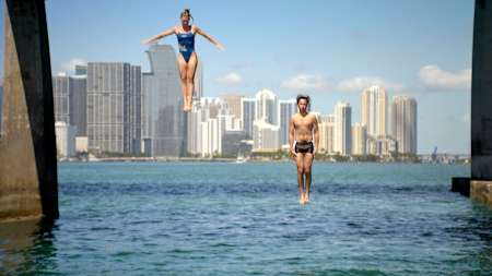 Juanpa training with Ellie Smart to attempt a 35-foot backflip