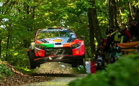 Rally car in mid-air, Thierry Neuville and Martijn Wydaeghe of team HYUNDAI SHELL MOBIS WORLD RALLY TEAM behind the wheel at World Rally Championship Croatia in Zagreb, Croatia, 2024.