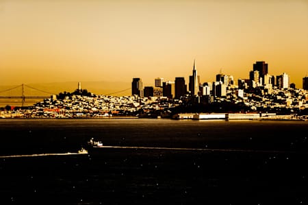 The Godzieks watch the sunset over San Francisco