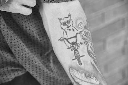 BMX Rider Kriss Kyles Living The Dream Tattoo auf dem Unterarm