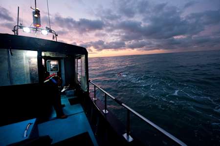 Paul watches over Howard as the sun comes up