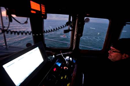 Howard can be seen swimming from the wheelhouse