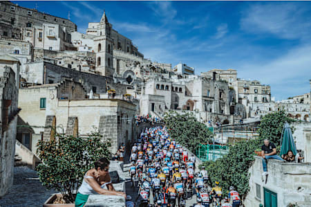 Cyclists flood the streets of Matera, Naples.