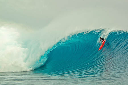 Ian Walsh surfs big waves off Tavarua Island, Fiji