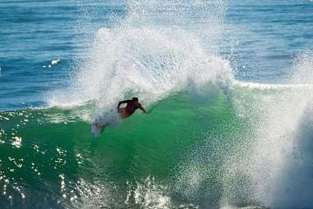 Taj Burrow won by surfing on the rail.