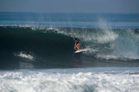 Carissa hides from the Balinese sun