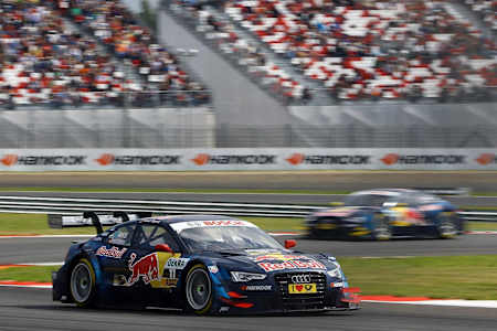 Mattias Ekstrom racing round a corner