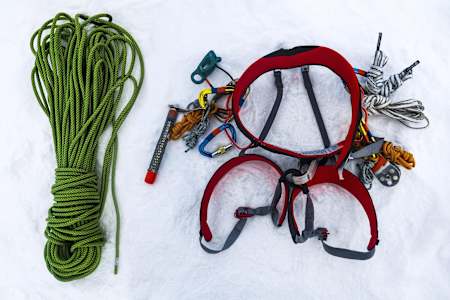 Rope and a fully equipped climbing harness 