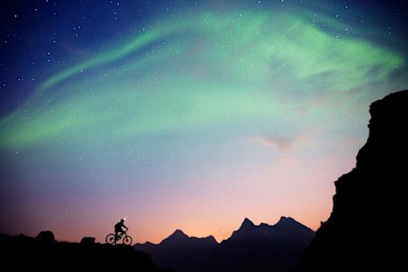 Mountainbiking under the northern lights in beautiful Lofoten.