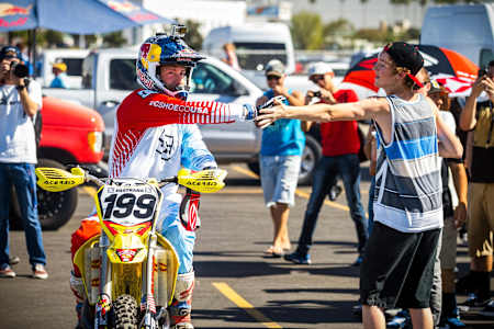 Travis Pastrana reaches the finish line of Red Bull Straight Rhythm 2014 in Pomona.