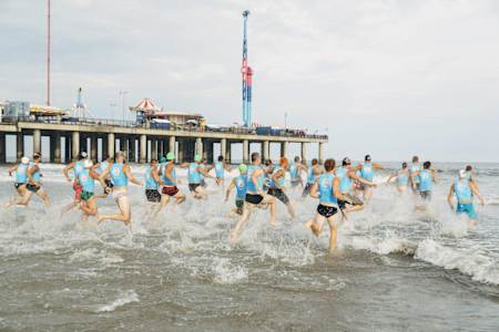 Round 1: Into the water for the swim relay race