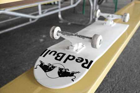 White-sprayed skateboard for Checkmates