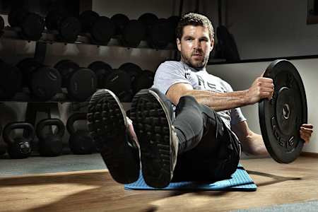 Dan Atherton builds core strength in the gym