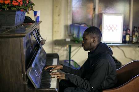 Nineteen-year-old Streatham rapper Dave at the piano