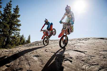 Cody Webb and Taylor Robert stoppies on the rocks