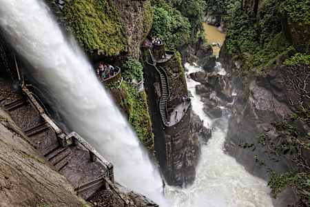 Overlooking the tourist route alongside Pailon del Diablo Waterfall in Ecuador, as popular but very wet attraction