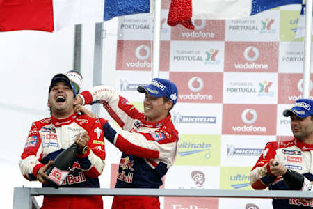 Ogier enjoys his victory on the podium