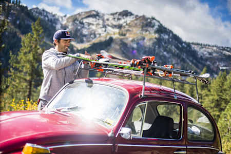 J.T. Holmes straps on his skis before heading up to the mountain.