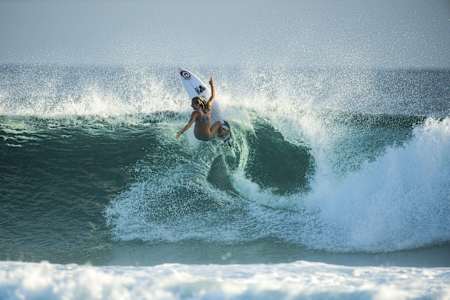 Pro surfer Nikki Van Dijk credits yoga for keeping her grounded